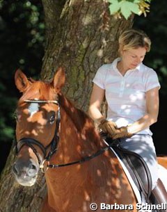 Nadine and Elvis getting ready for an early morning ride to beat the heat