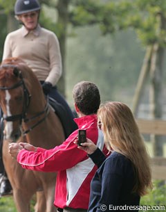 Dover working with Ashley Holzer, Ashley's groom is videotaping the session