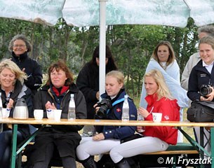 The Danish parents and riders watch their team mates
