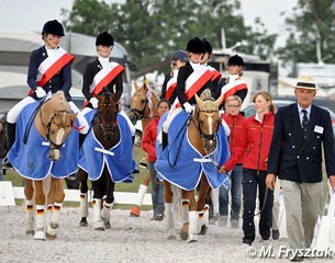 The German pony team enters the arena for the prize giving