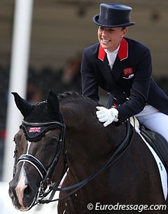 Charlotte Dujardin gives Valegro a big pat