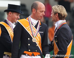 Matthias Rath and Edward Gal shake hands on the podium