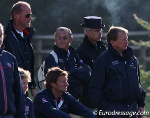 The French team watching the warm up early in the morning