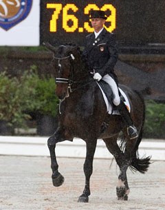 Steffen Peters overcomes the rain and wins the Grand Prix at the 2011 U.S. Dressage Championships :: Photo © Sue Stickle