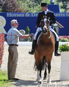 Jan Ebeling discusses his test with trainer Wolfram Wittig