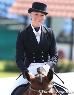 Finland's Stella Hagelstam is all smiles after her ride on Soraya II (by Sandro Hit)
