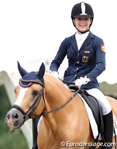 Anna Lisa Theile is all smiles on Desmond when she finishes her team test ride