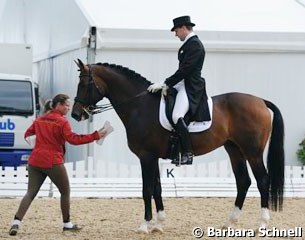 Isabell Werth coaches her "Bereiter" Matthias Bouten on Flatley