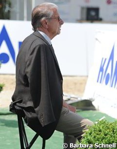 Belgian team trainer Volker Moritz watches Devroe in action