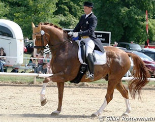 Hans Peter Bauer on the Bundeschampionate medal winning Wambo