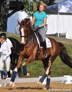 German Olympian Nadine Capellmann was not wearing a helmet though... Here she's schooling her small tour horse Diamond Girl (by Diamond Hit)