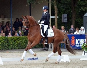 Emmelie Scholtens and Charmeur win the 2011 Pavo Cup Finals :: Photo courtesy www.kwpn.nl