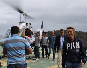 Edward Gal, Thomas Bauer and Hans Peter Minderhoud return from a helicopter ride