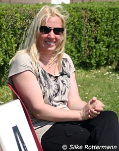 Fiona Bigwood watching her partner Anders ride