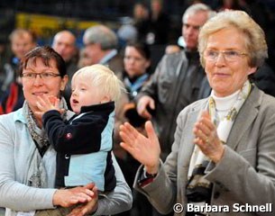 Isabell nanny Susanne Dumke holding Werth's child Frederik, flanked by her sponsor Madeleine Winter Schulze