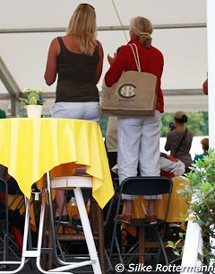 People were standing on chairs to catch a glimpse of the prize giving ceremony