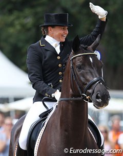 Dorothee Schneider waves to the crowds