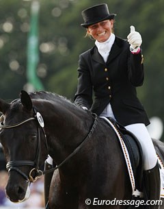 Ines Westendarp and Furstenball gives a thumbs up to her fans after putting solid 9s on the score board