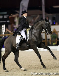 French Camille Judet-Cheret on the 15-year old stallion Ronaldo (by Rubinstein). Many mistakes in the canter work pushed their score down considerably.