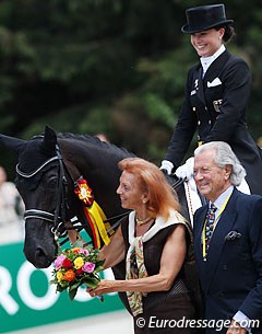 Sponsor Marina Meggle cuddles with Kristina Sprehe's Desperados at the GP Special prize giving at the 2012 CDIO Aachen :: Photo © Astrid Appels