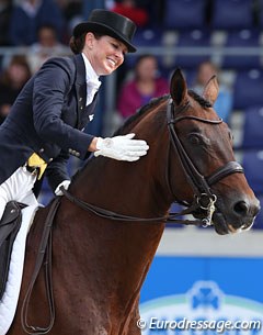 Lyndal Oatley gives Sandro Boy a big pat at the 2012 CDIO Aachen :: Photo © Astrid Appels