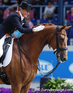 Marlies van Baalen gives Miciano a big pat after finishing her test at the 2012 CDIO Aachen :: Photo © Astrid Appels