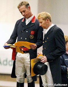 Winner Carl Hester and third placed Gareth Hughes have a look at Carl's British Grand Prix record scoring test