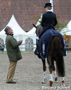 Trainer Klaus Balkenhol gives tips to Helen Langehanenberg