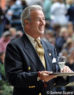 Michael Ripploh offers a glass of champagne to each finalist finishing his or her test