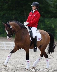 Harriette Williams warming up Madam's Miss Maria at the 2012 CDI-P Compiegne