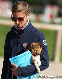 Alizee Froment's puppy has an issue to its leg and needs to be carried