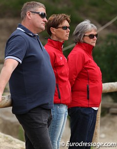 Koch's trainer Soren Vallentin, Danish team trainer Vibeke Degn Andersen and Danish chef d'equipe Rigmor Kristensen watch Kristine Koch ride