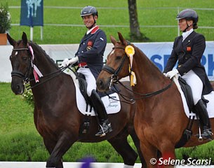 Prix St Georges winner Carl Hester on Dances with Wolves (by Donnerschwee) flanked by Henriette Andersen on Warlock's Charm