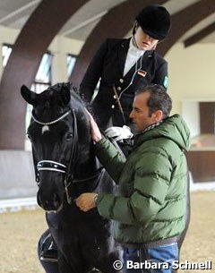 Anna Christina Abbelen on her junior riders' horse Furst on Tour with coach Heiner Schiergen on her side