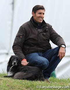 Belgian trainer Wim Verwimp watches partner Fanny Verliefden compete