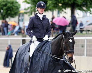 Nathalie zu Sayn-Wittgestein and Digby dressed for the rainy affair 