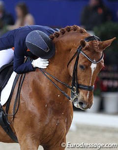 Adelinde kisses her horse in the neck at the end of the ride