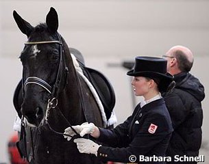 Klaus Husenbeth helping young riders' daughter Nadine with Riverdance