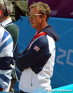 Carl Hester in full concentration, watching Charlotte's ride