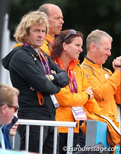 Dutch team coach Sjef Janssen watches Van der Meer compete