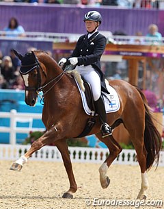 Finnish Emma Kanerva on the Hanoverian Sini Spirit (by Espri). This chestnut has springs in his legs in passage, but he is very active with his tongue, sticking it out in front regularly