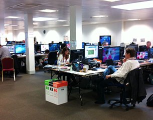 The big boys at Reuters. More tv-screens in their room !