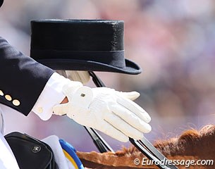 Dressage apparel: top hat and gloves