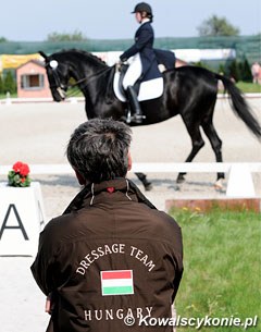 Hungarian trainer looking at his student