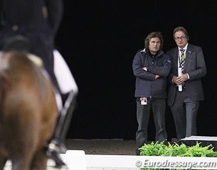 Dutch team trainer Sjef Janssen conferring with show director Frank Kemperman during Hans Peter Minderhoud's test