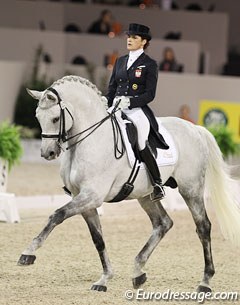 Polish Katarzyna Milczarek on her Polish bred Holsteiner stallion Ekwador (by Heraldik xx). The one tempi's were fantastic but the stallion travelled too much forward in the piaffe