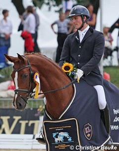 Michael Eilberg and Woodlander Farouche at the 2012 World Young Horse Championships :: Photo © Christina Beuke