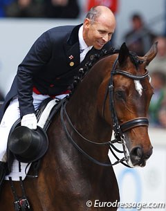 Steffen Peters pats Legolas after completing the Kur to Music at the 2013 CDIO Aachen :: Photo © Astrid Appels