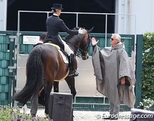 Victoria Max-Theurer and trainer Wolfram Wittig high five