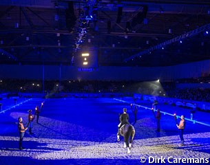 Anky and Salinero entering the ring for the retirement ceremony. Her past Olympic team mates (2004 to 2012) are carrying the torches to salute the pair